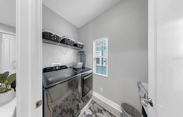 6545 Simone Shores Cir, Apollo Beach, FL 33572 - washroom featuring separate washer and dryer and baseboards
