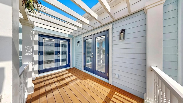 6545 Simone Shores Cir, Apollo Beach, FL 33572 - wooden deck featuring french doors and a pergola