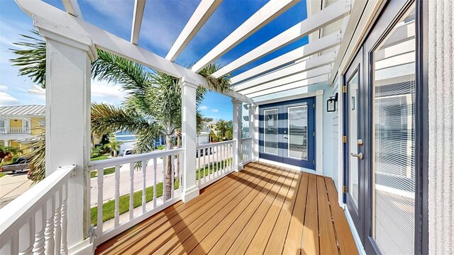 6545 Simone Shores Cir, Apollo Beach, FL 33572 - wooden terrace with a pergola and french doors