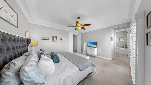 6545 Simone Shores Cir, Apollo Beach, FL 33572 - bedroom with light colored carpet, a ceiling fan, and crown molding