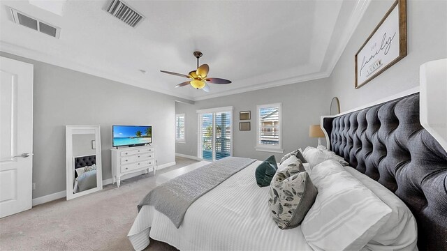 6545 Simone Shores Cir, Apollo Beach, FL 33572 - bedroom featuring light colored carpet, ceiling fan, and crown molding