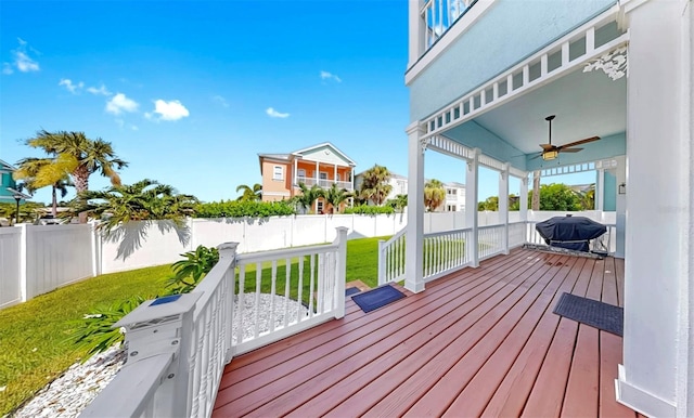 6545 Simone Shores Cir, Apollo Beach, FL 33572 - deck featuring a fenced backyard, ceiling fan, and a grill
