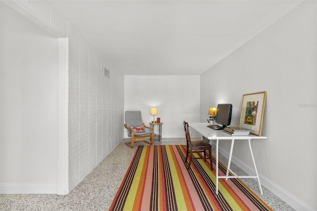 7950 Causeway Blvd N, Saint Petersburg, FL 33707 - office area featuring speckle patterned floor and baseboards