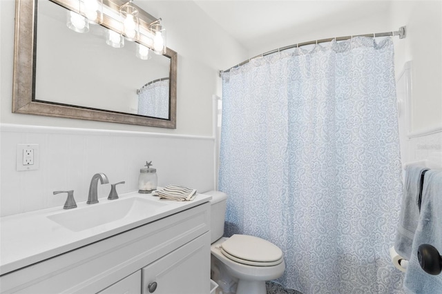 7950 Causeway Blvd N, Saint Petersburg, FL 33707 - full bath featuring vanity and a wainscoted wall