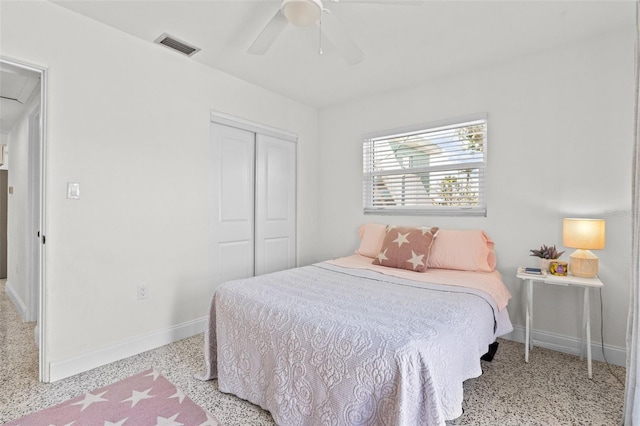 7950 Causeway Blvd N, Saint Petersburg, FL 33707 - bedroom featuring speckled floor, a closet, ceiling fan, and attic access
