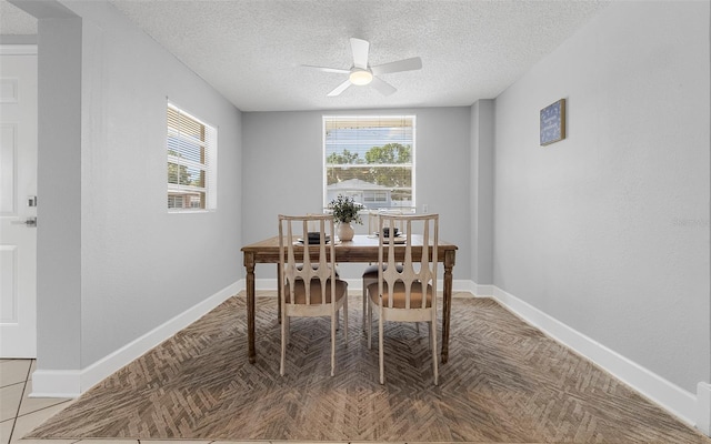 2614 W Idlewild Ave, Tampa, FL 33614 - dining area with a ceiling fan and a textured ceiling