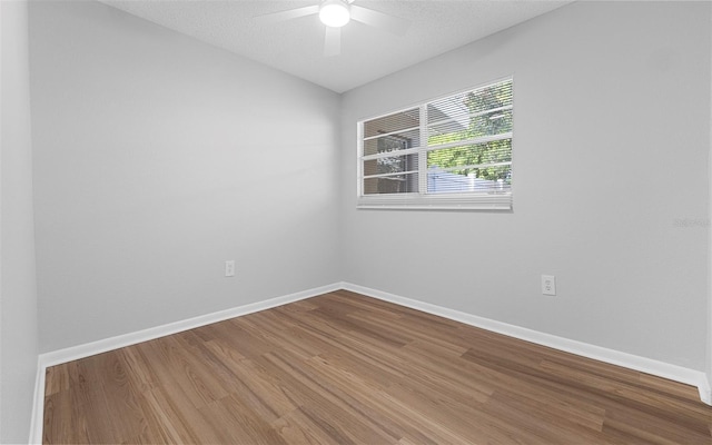 2614 W Idlewild Ave, Tampa, FL 33614 - unfurnished room featuring wood finished floors and ceiling fan