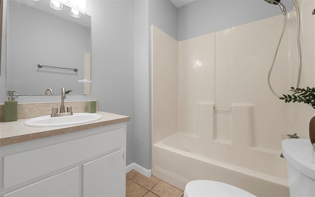 2614 W Idlewild Ave, Tampa, FL 33614 - bathroom featuring tile patterned floors, shower / bathtub combination, and vanity