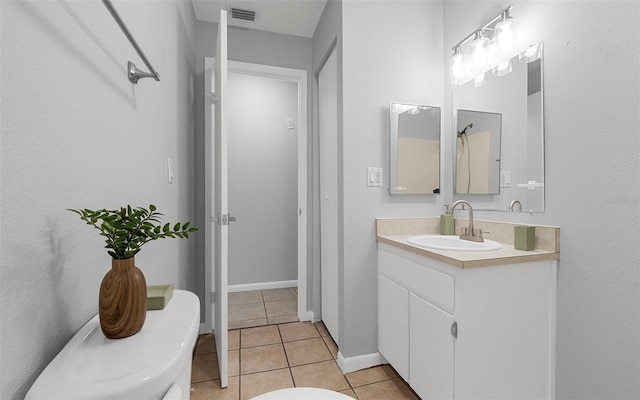 2614 W Idlewild Ave, Tampa, FL 33614 - bathroom featuring vanity and tile patterned floors
