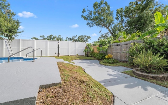 2614 W Idlewild Ave, Tampa, FL 33614 - fenced backyard with a patio
