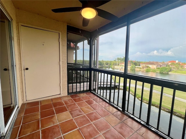 2400 Feather Sound Dr Unit 935, Clearwater, FL 33762 - unfurnished sunroom with a water view and ceiling fan