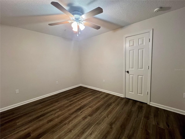 2400 Feather Sound Dr Unit 935, Clearwater, FL 33762 - empty room with dark wood finished floors, a textured ceiling, a ceiling fan, and a smoke detector