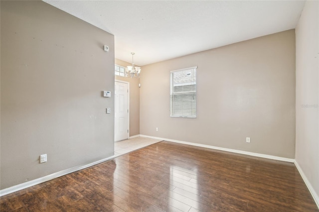 10343 Avelar Ridge Dr, Riverview, FL 33578 - spare room featuring a chandelier and wood finished floors