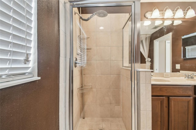 10343 Avelar Ridge Dr, Riverview, FL 33578 - bathroom featuring double vanity and a stall shower