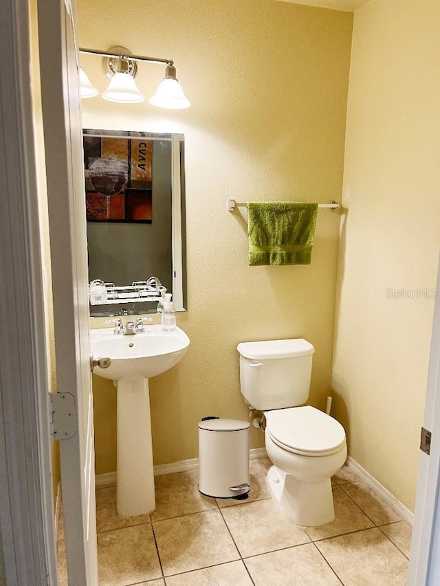 7618 Tangle Rush Dr, Gibsonton, FL 33534 - half bathroom featuring toilet and tile patterned floors