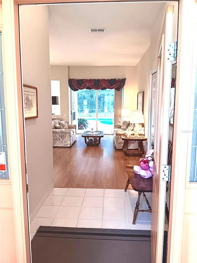 3740 Emerald Ln, Mulberry, FL 33860 - corridor featuring tile patterned flooring