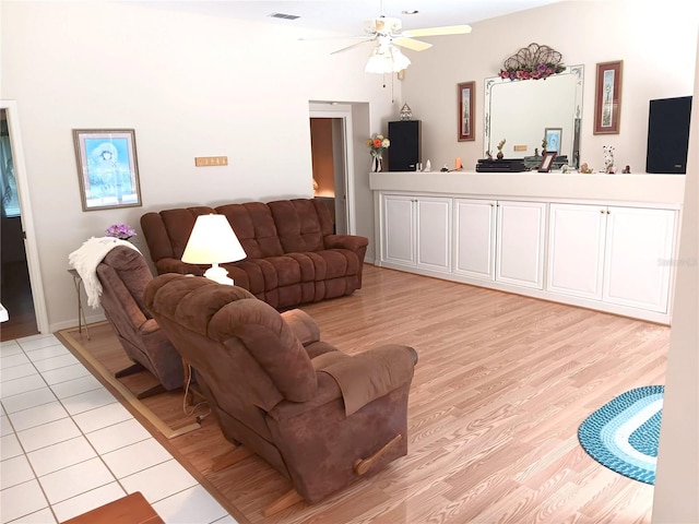 3740 Emerald Ln, Mulberry, FL 33860 - living room featuring a ceiling fan and light wood-style floors