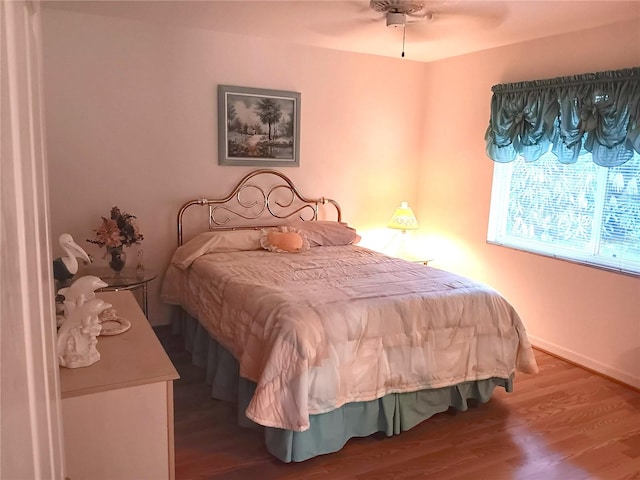 3740 Emerald Ln, Mulberry, FL 33860 - bedroom with wood finished floors and baseboards