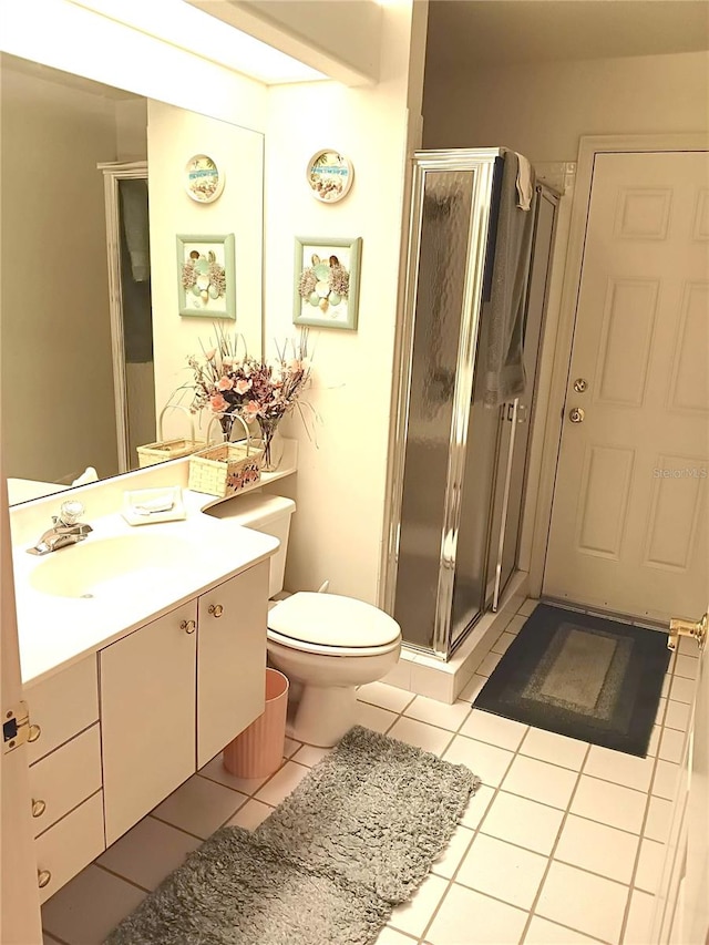 3740 Emerald Ln, Mulberry, FL 33860 - bathroom with a shower stall, tile patterned floors, and vanity