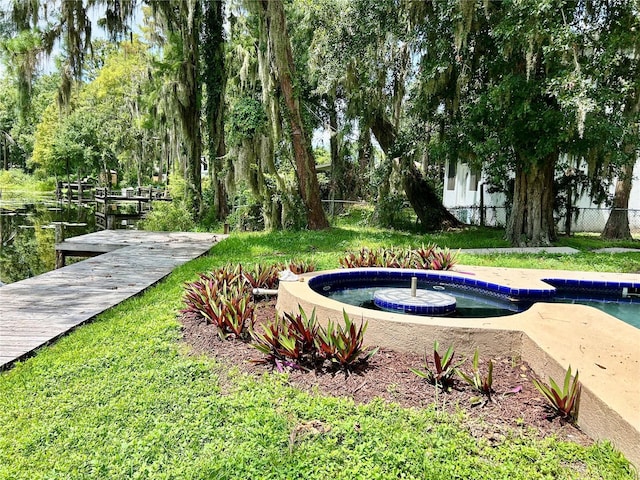 17017 Paula Ln, Lutz, FL 33558 - view of community with a pool and a boat dock