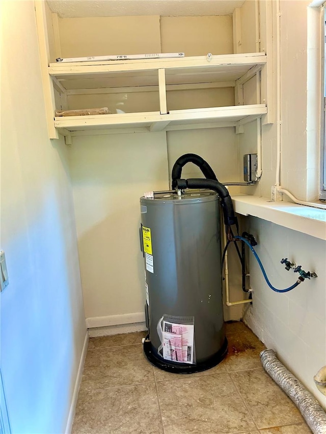 17017 Paula Ln, Lutz, FL 33558 - utility room featuring electric water heater