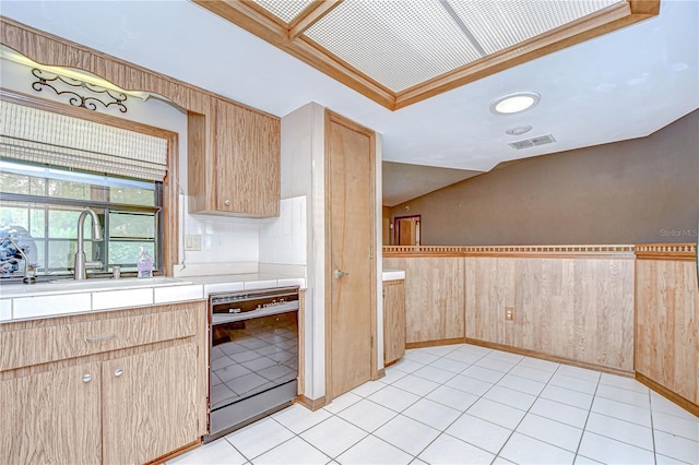 11070 Tilburg St, Spring Hill, FL 34608 - kitchen featuring dishwasher, light brown cabinetry, wainscoting, and backsplash