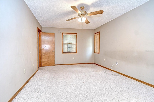 11070 Tilburg St, Spring Hill, FL 34608 - carpeted empty room with a ceiling fan and a textured ceiling
