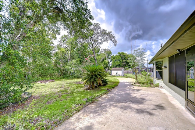 11070 Tilburg St, Spring Hill, FL 34608 - view of grassy yard featuring a patio area