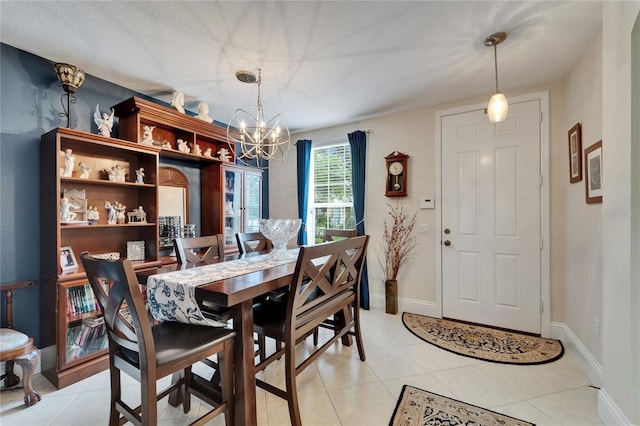 5642 Simonton St, Bradenton, FL 34203 - dining room with a chandelier and light tile patterned flooring