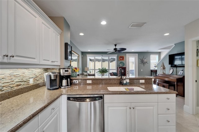 5642 Simonton St, Bradenton, FL 34203 - kitchen with dishwasher, a ceiling fan, a peninsula, recessed lighting, and decorative backsplash