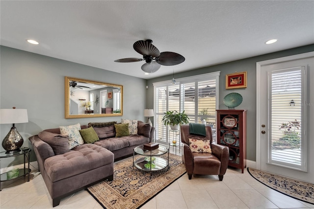 5642 Simonton St, Bradenton, FL 34203 - living room with ceiling fan, recessed lighting, and light tile patterned floors