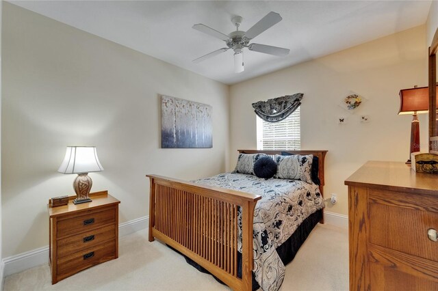 5642 Simonton St, Bradenton, FL 34203 - bedroom with carpet floors and a ceiling fan