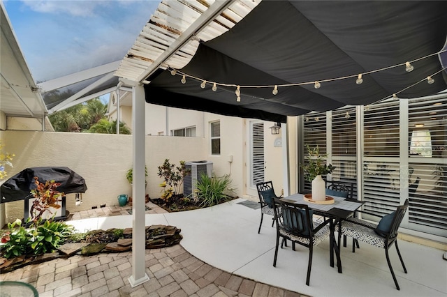 5642 Simonton St, Bradenton, FL 34203 - view of patio / terrace with outdoor dining area, a pergola, and a grill
