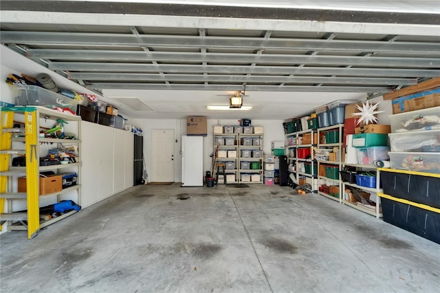 5642 Simonton St, Bradenton, FL 34203 - garage featuring a garage door opener