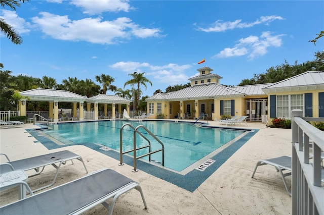 5642 Simonton St, Bradenton, FL 34203 - community pool featuring a patio area