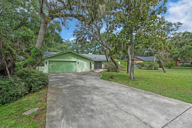 8470 Cranes Roost Dr, New Port Richey, FL 34654 - ranch-style home featuring driveway, a garage, and a front yard