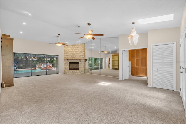 8470 Cranes Roost Dr, New Port Richey, FL 34654 - unfurnished living room with carpet, a fireplace, plenty of natural light, recessed lighting, and high vaulted ceiling