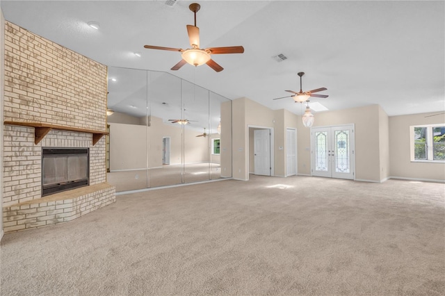 8470 Cranes Roost Dr, New Port Richey, FL 34654 - unfurnished living room with ceiling fan, lofted ceiling, carpet, and a fireplace
