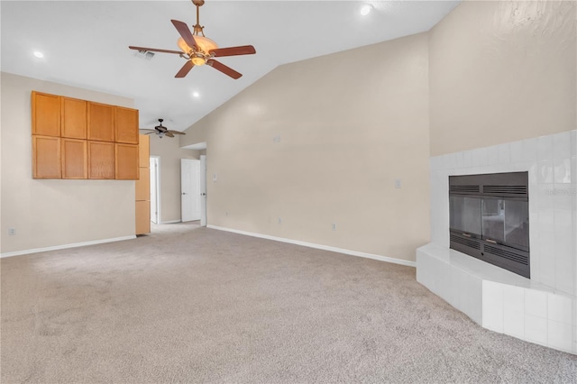 8470 Cranes Roost Dr, New Port Richey, FL 34654 - unfurnished living room featuring ceiling fan, carpet, high vaulted ceiling, a tiled fireplace, and recessed lighting