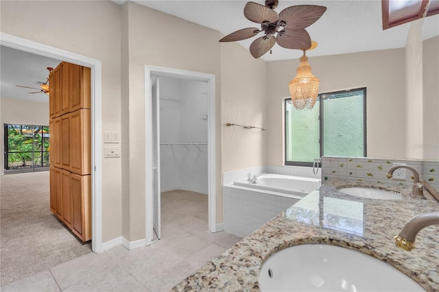 8470 Cranes Roost Dr, New Port Richey, FL 34654 - full bath featuring ceiling fan, plenty of natural light, a bath, and double vanity