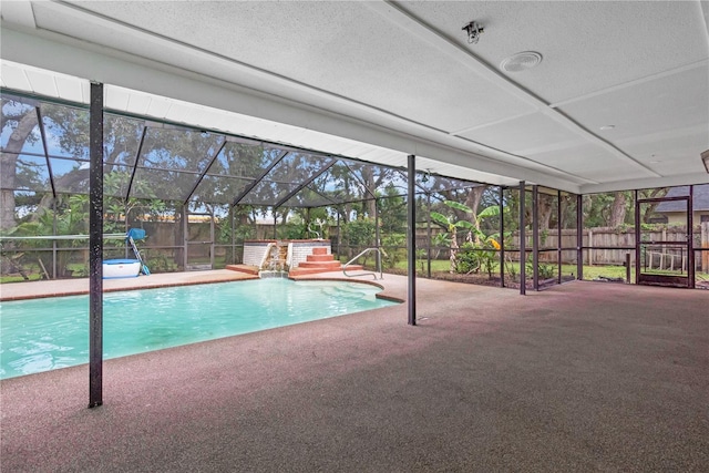 8470 Cranes Roost Dr, New Port Richey, FL 34654 - outdoor pool with a patio, a fenced backyard, and glass enclosure