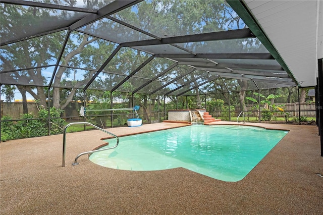 8470 Cranes Roost Dr, New Port Richey, FL 34654 - view of swimming pool featuring a patio area, a fenced backyard, and a lanai