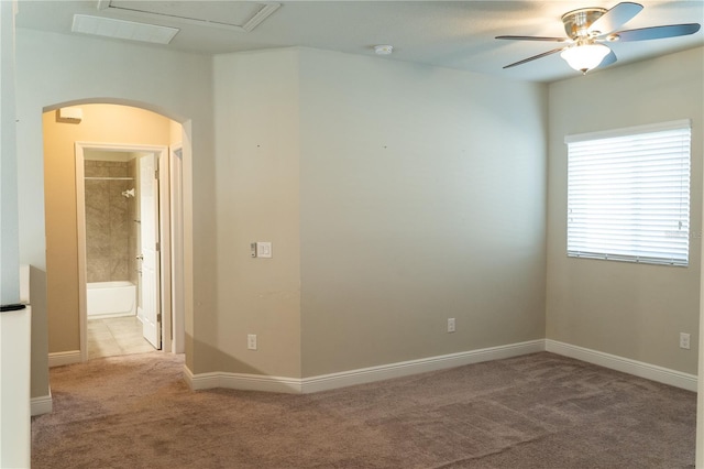 7508 Sea Lilly Ct, Apollo Beach, FL 33572 - carpeted empty room with arched walkways and ceiling fan