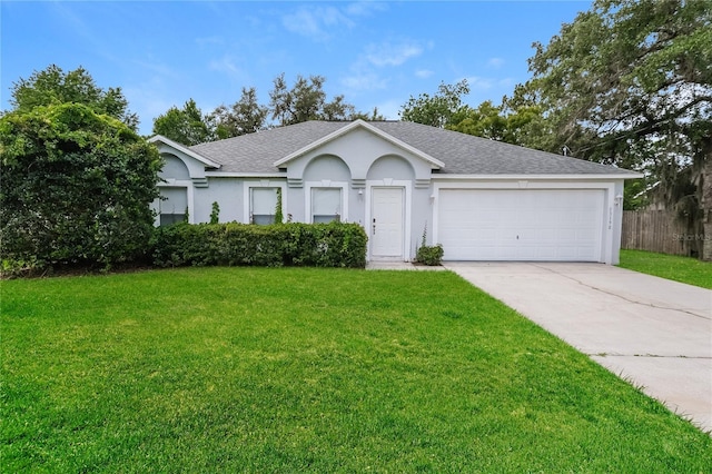 13190 Drysdale St, Spring Hill, FL 34609 - single story home featuring roof with shingles, an attached garage, concrete driveway, and stucco siding