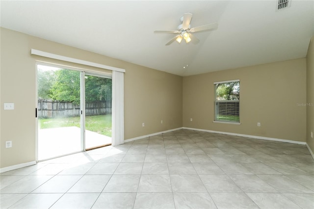 13190 Drysdale St, Spring Hill, FL 34609 - unfurnished room with ceiling fan, healthy amount of natural light, and lofted ceiling