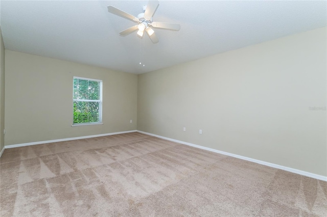 13190 Drysdale St, Spring Hill, FL 34609 - carpeted spare room featuring baseboards and ceiling fan