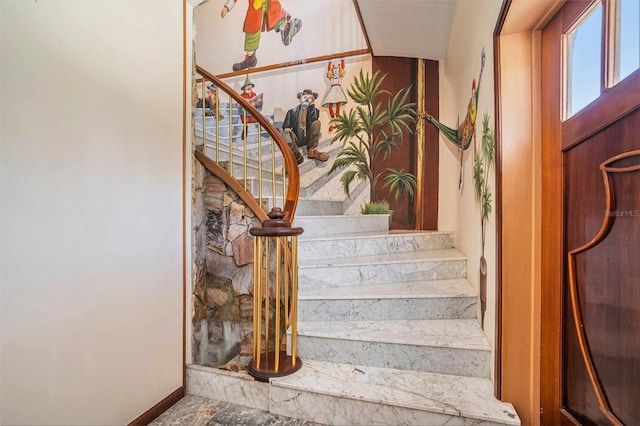 7715 Riverview Dr, Riverview, FL 33578 - staircase with baseboards