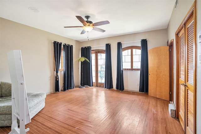 7715 Riverview Dr, Riverview, FL 33578 - unfurnished bedroom featuring ceiling fan and a baseboard radiator
