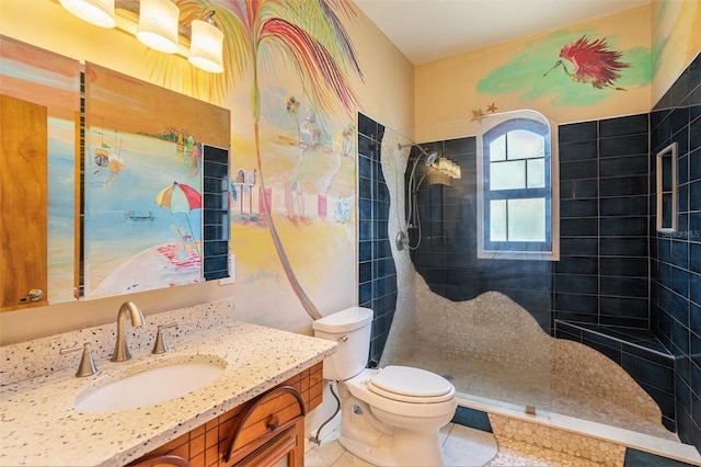 7715 Riverview Dr, Riverview, FL 33578 - bathroom with vanity, a tile shower, and tile patterned flooring