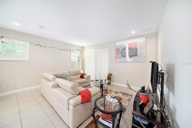 2101 Sunset Wind Loop, Oldsmar, FL 34677 - living area with light tile patterned flooring, plenty of natural light, and recessed lighting